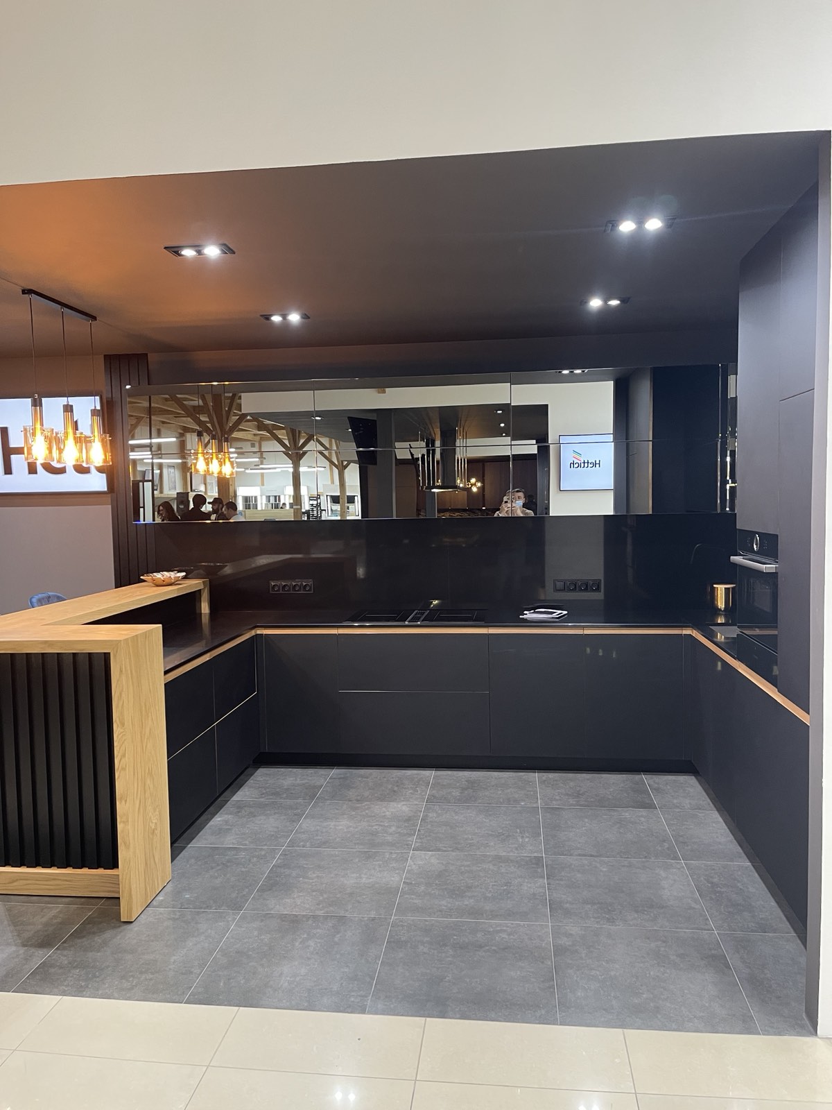 Commercial counter joinery with dark cabinetry