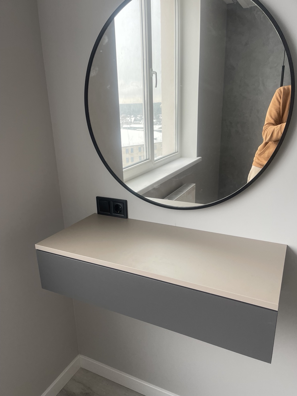 Wall-hung desk and custom furniture details with drawer storage