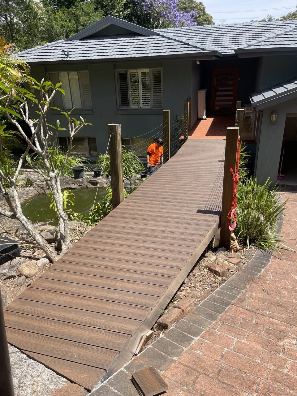 Entry path decking leading toward a home