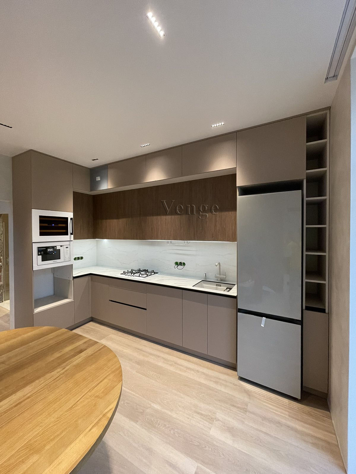 White kitchen joinery with timber-look overhead cabinetry