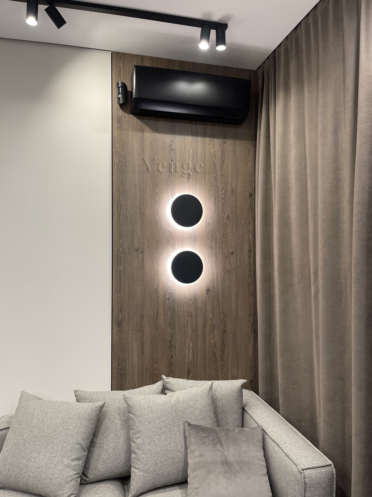 Wall feature cabinetry with circular detail