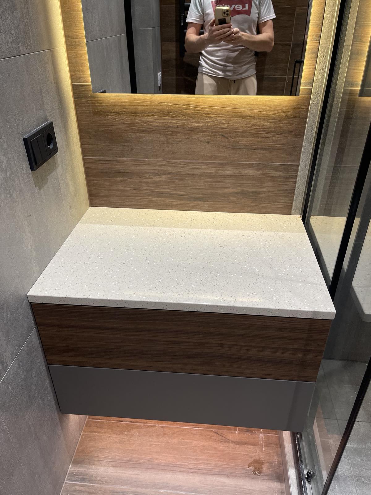 Timber vanity console joinery with stone top and drawer storage