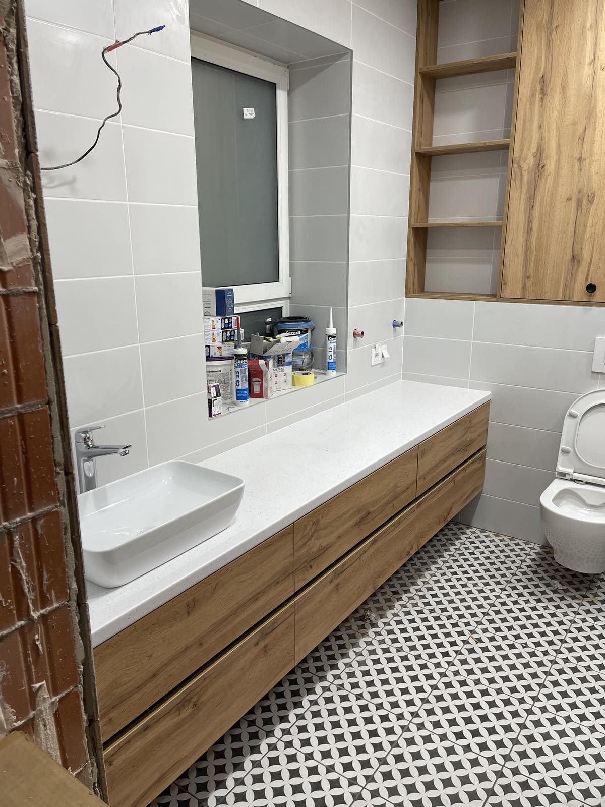 Long timber-look bathroom vanity joinery