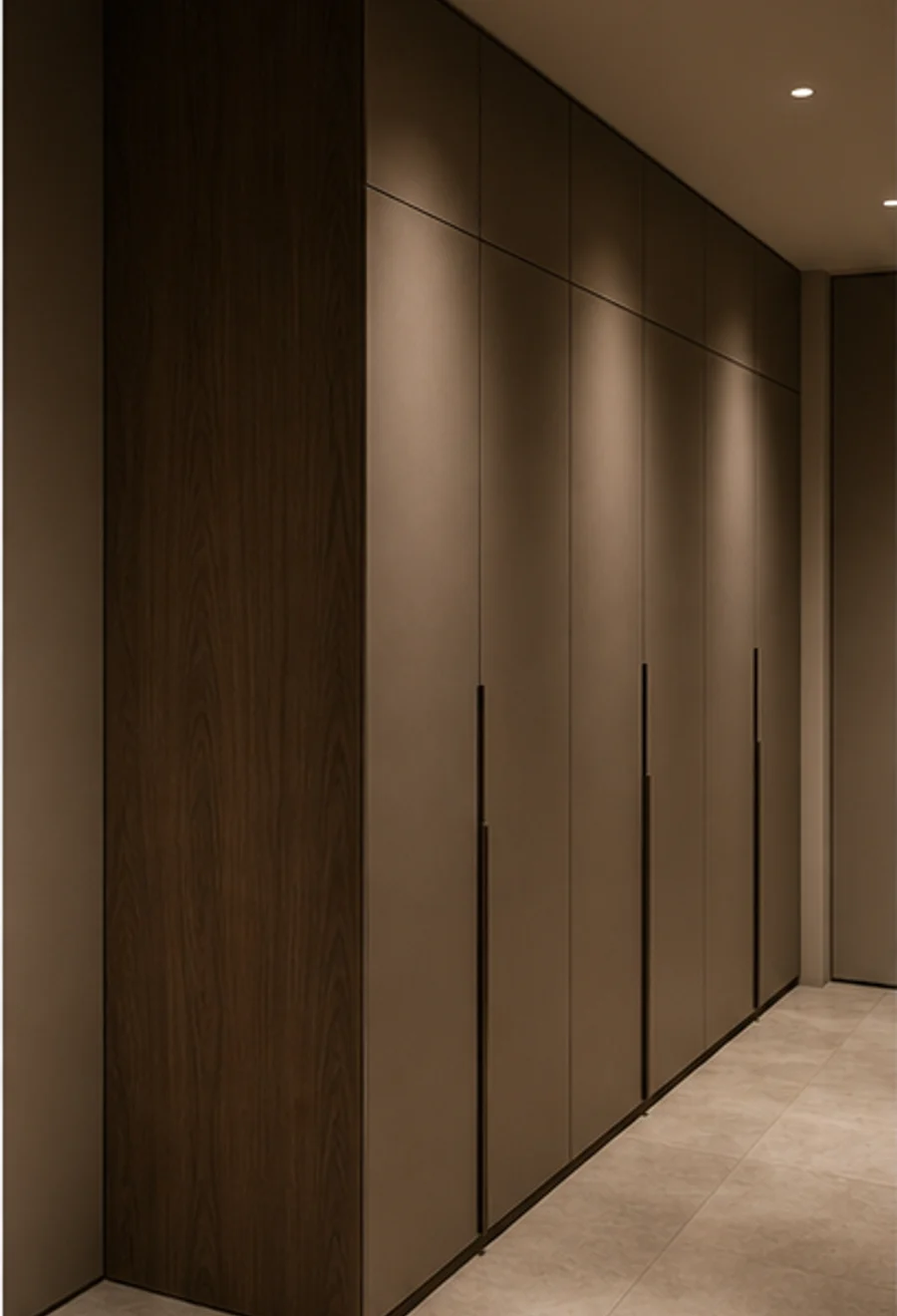 Full-height custom wardrobe wall with matte cabinetry doors